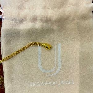 Uncommon James gold seashell necklace